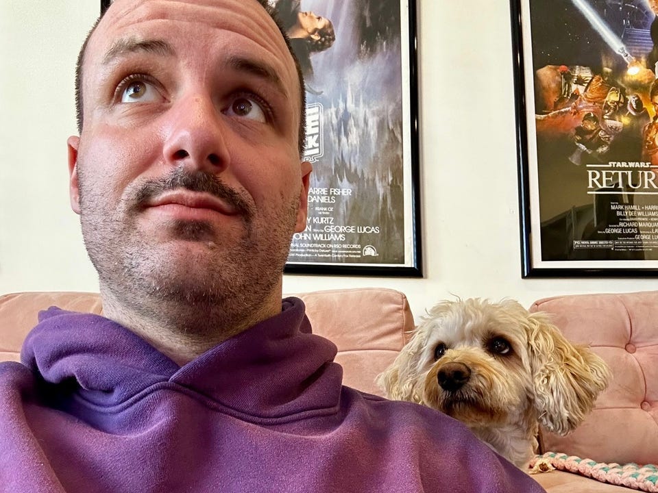 Trevor Gebhardt and his dog Hank in his LA Apartment in April 2024