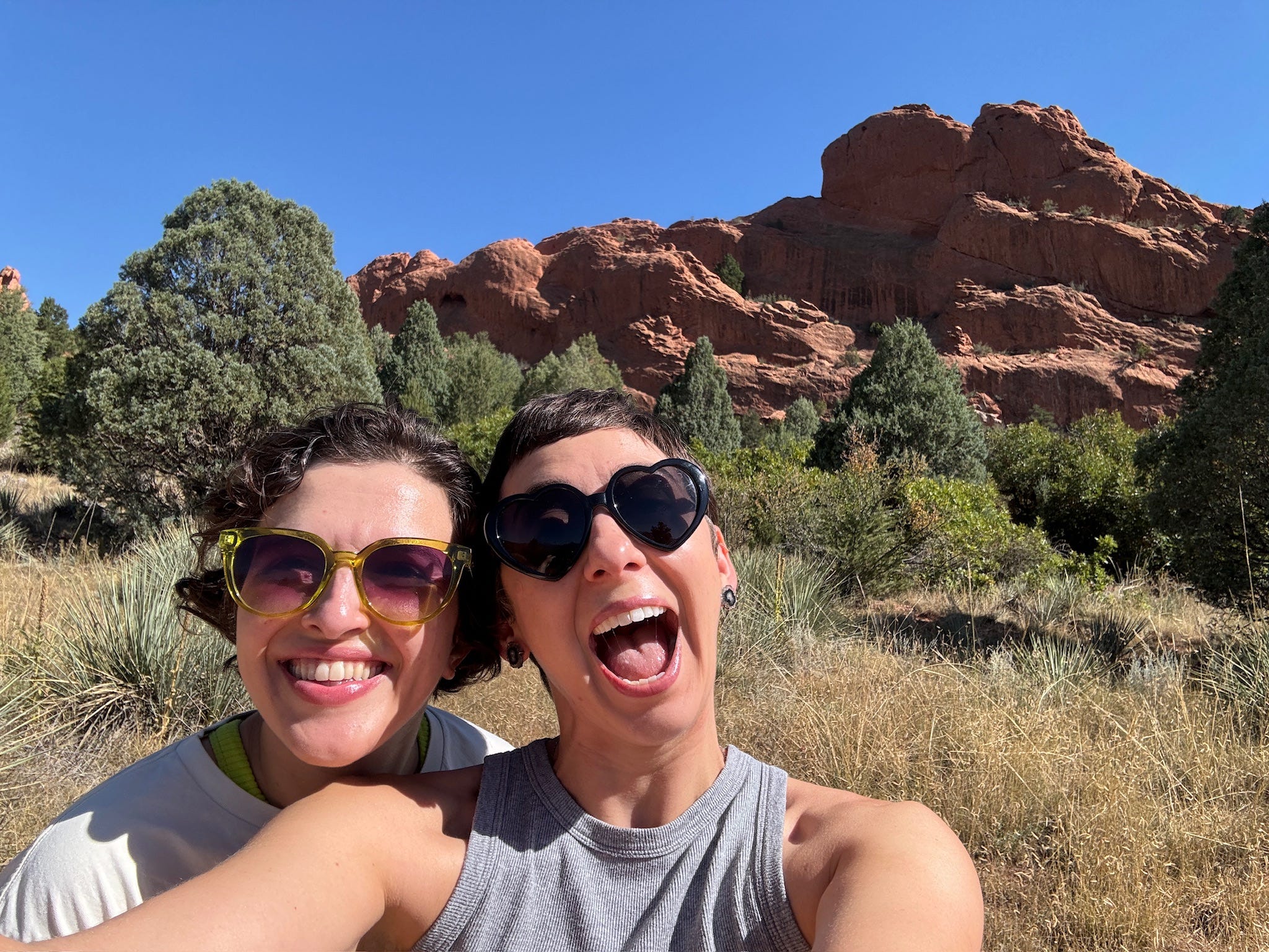 The author and her friend posing while on a hike in the Garden of the Gods in Colorado.