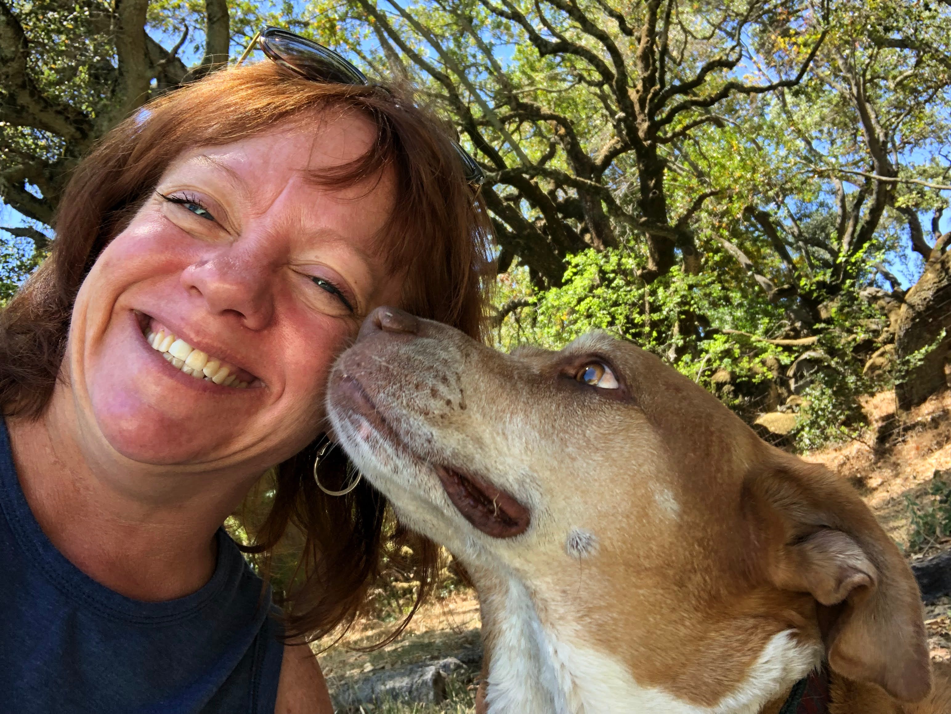 close up of woman with dog