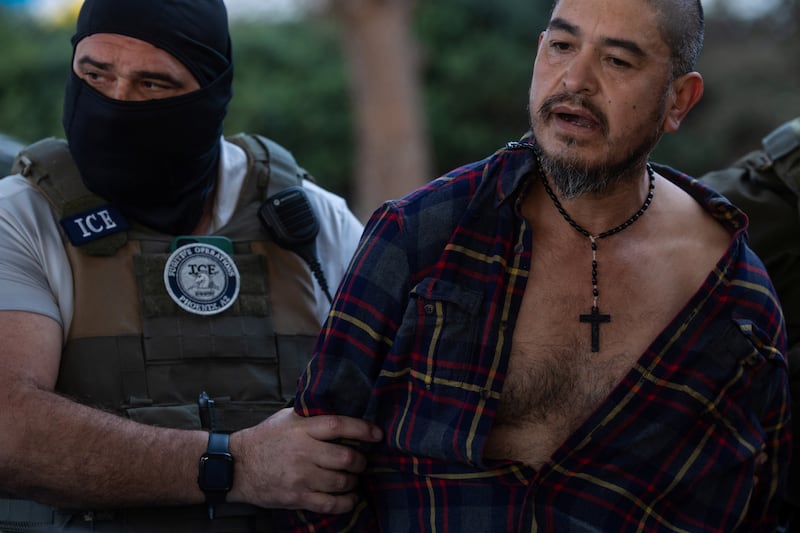 A 47-year-old Mexican man with three convictions for driving under the influence, is arrested by federal law enforcement agents led by U.S. Immigration and Customs Enforcement in Rex, south of Atlanta, Georgia, February 5, 2025. The man declined to comment. REUTERS/Carlos Barria