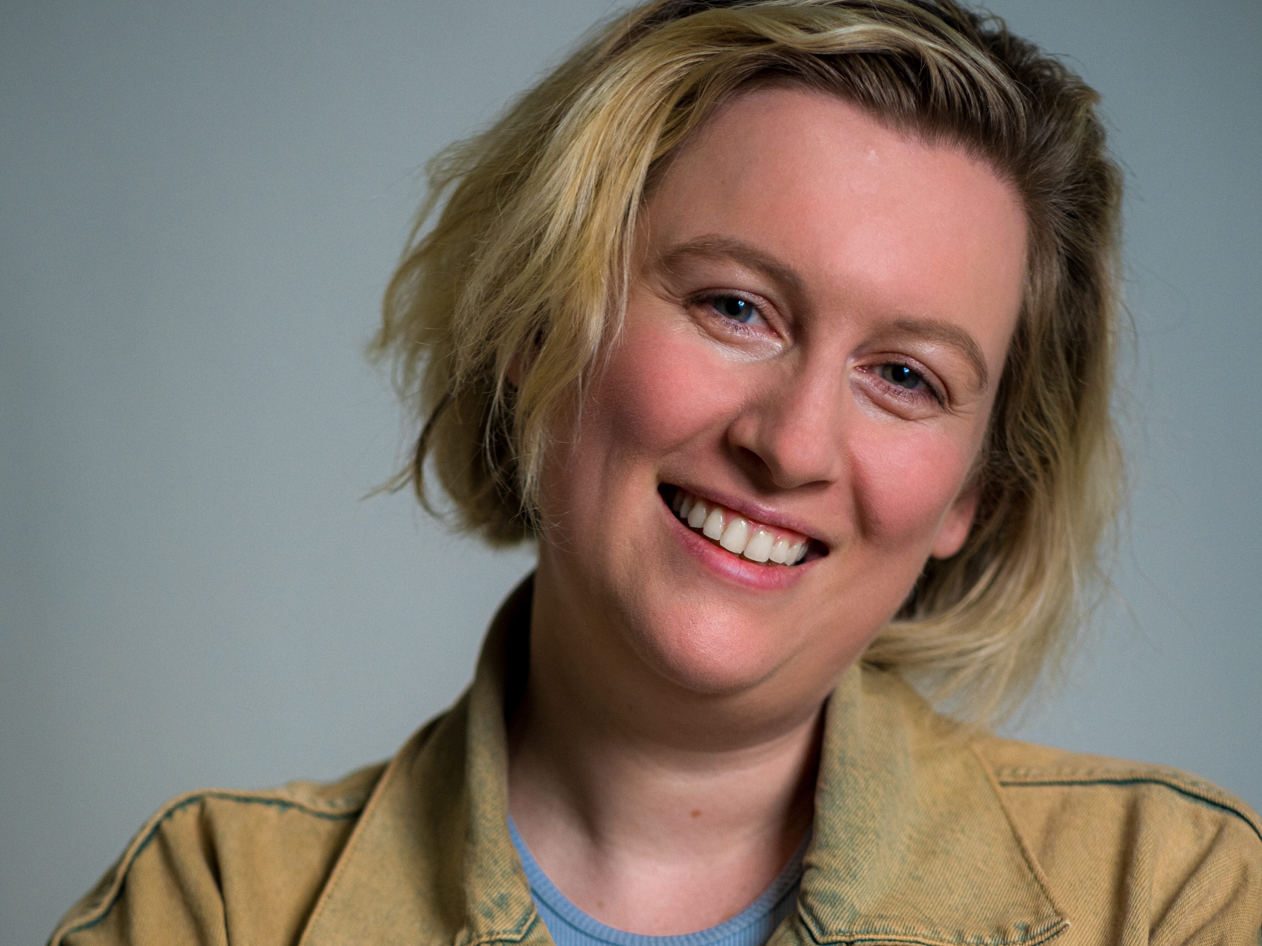 Headshot of Minta Carlson, Sr. Creative AI Architect at Moonvalley's AI film studio, Asteria