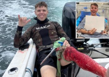 Incredible photo shows fisherman smiling while covered in blood from ‘gnarly’ shark attack