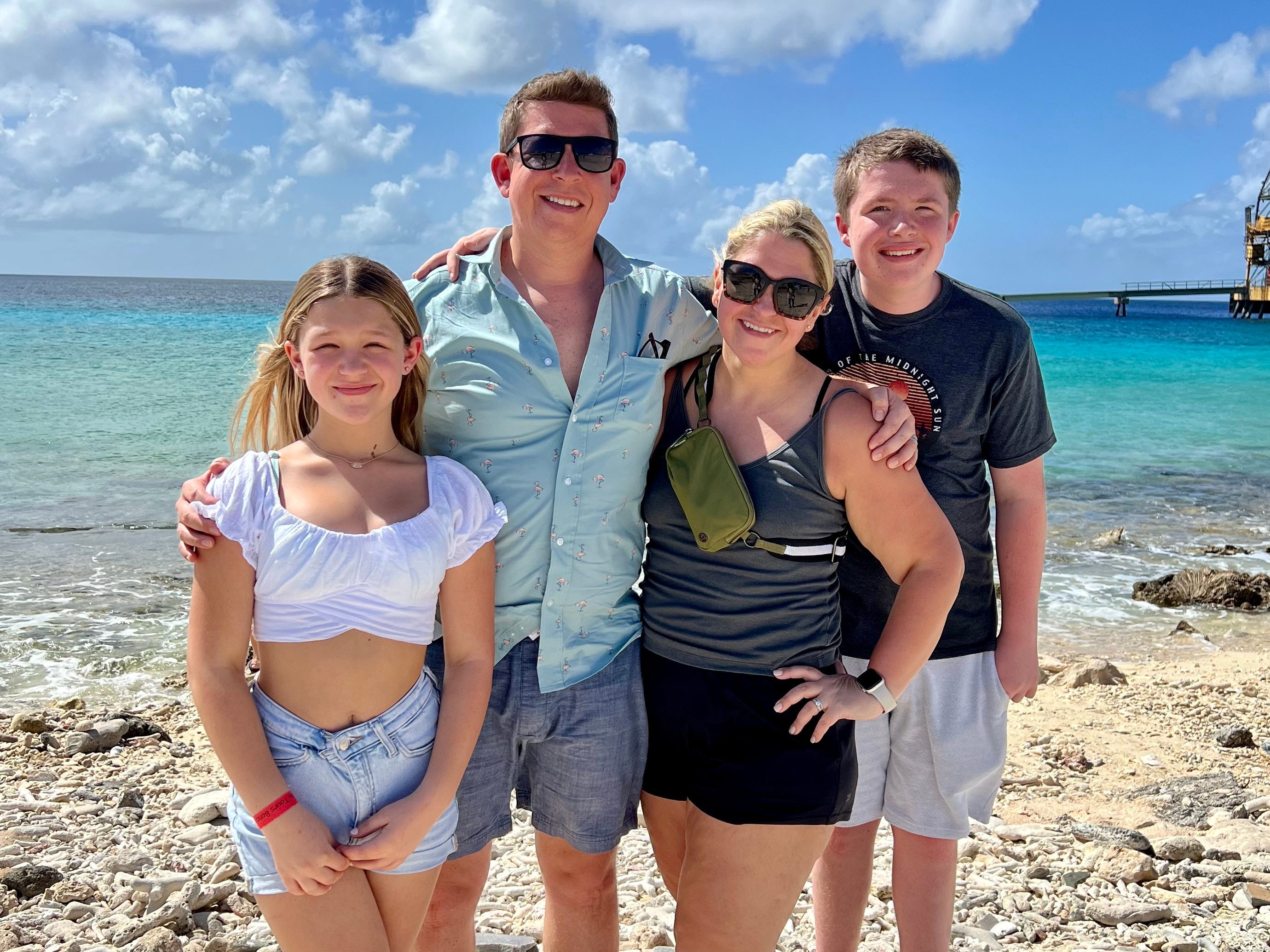 The author with her family on a beach.