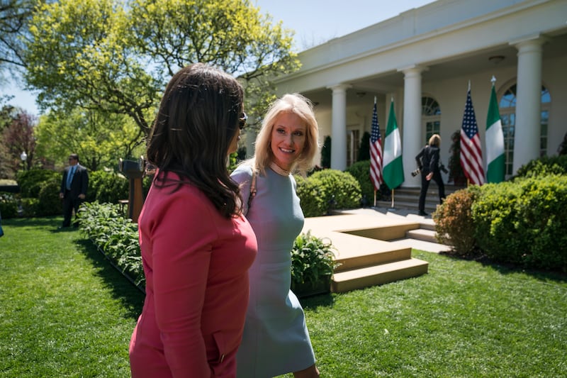 White House Press Secretary Sarah Huckabee Sanders and Kellyanne Conway