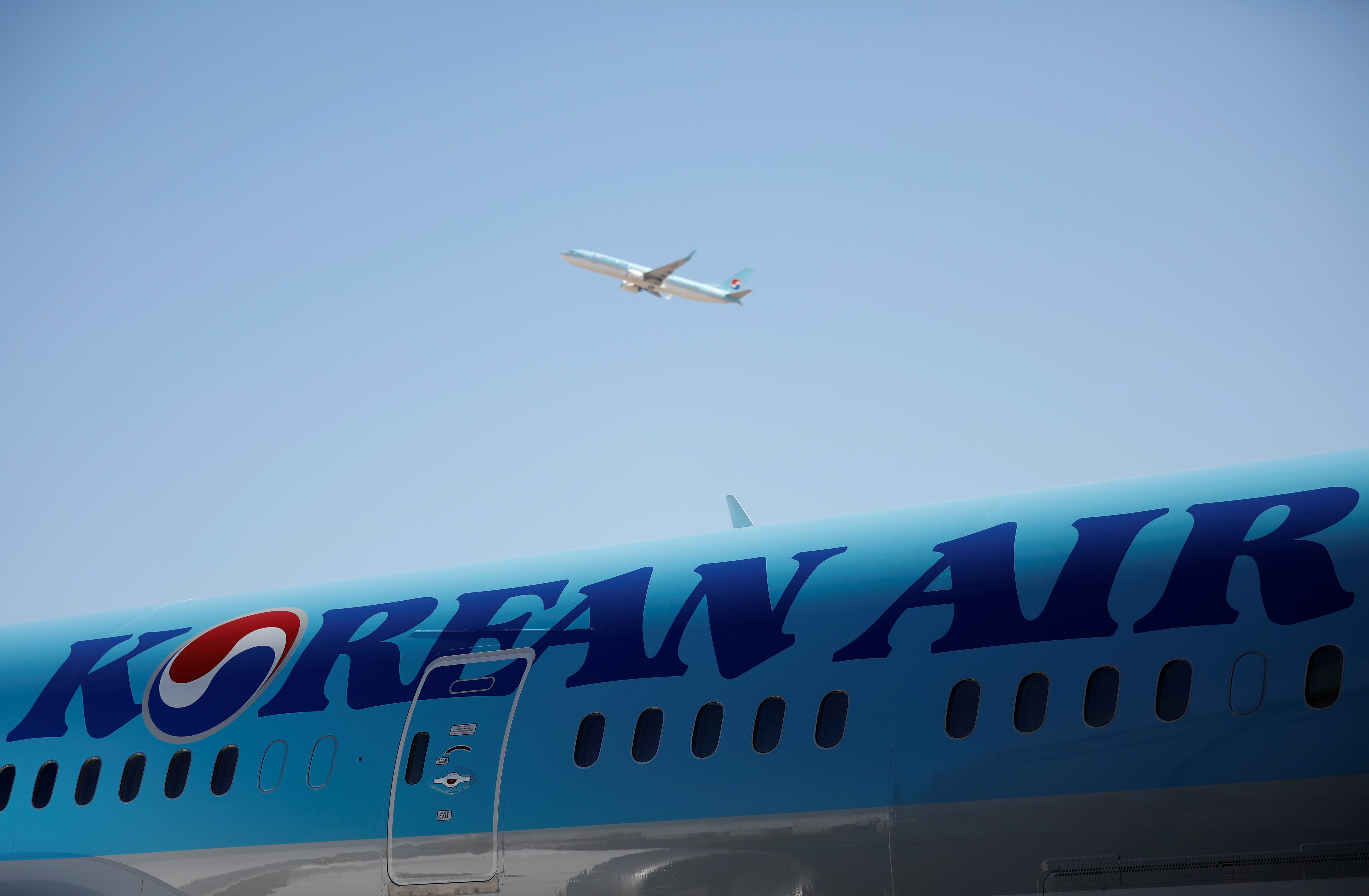 FILE PHOTO - The logo of Korean Air Lines is seen on a plane at its aviation shed in Incheon, South Korea, February 27, 2017.  REUTERS/Kim Hong-Ji/File Picture