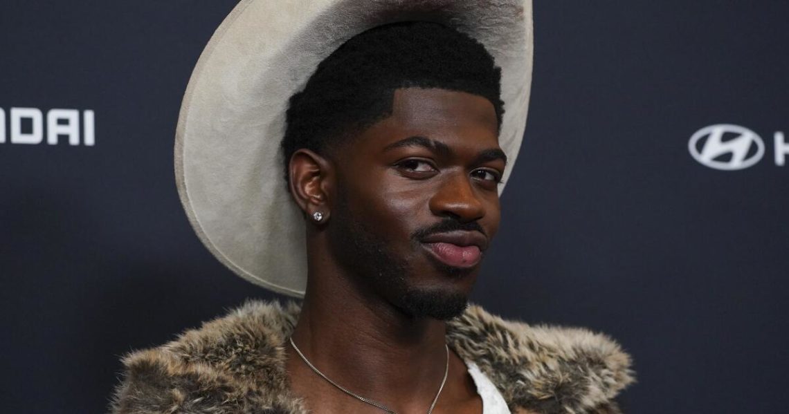 Lil Nas X hospitalized for possible overdose, arrested on suspicion of charging at police