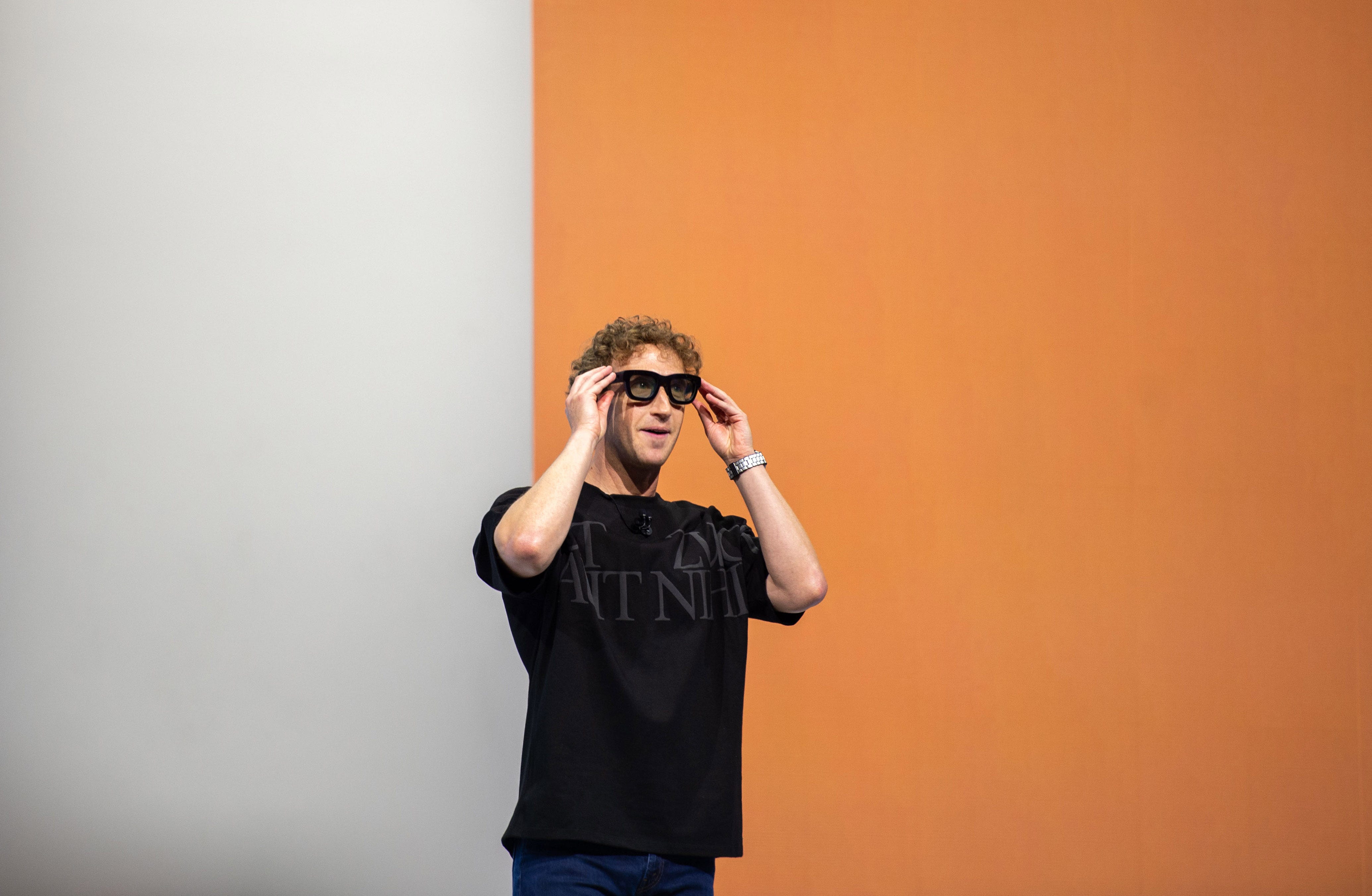 A photo of Mark Zuckerberg demoing Meta's Orion augmented-reality smart glasses at Meta Connect 2024.