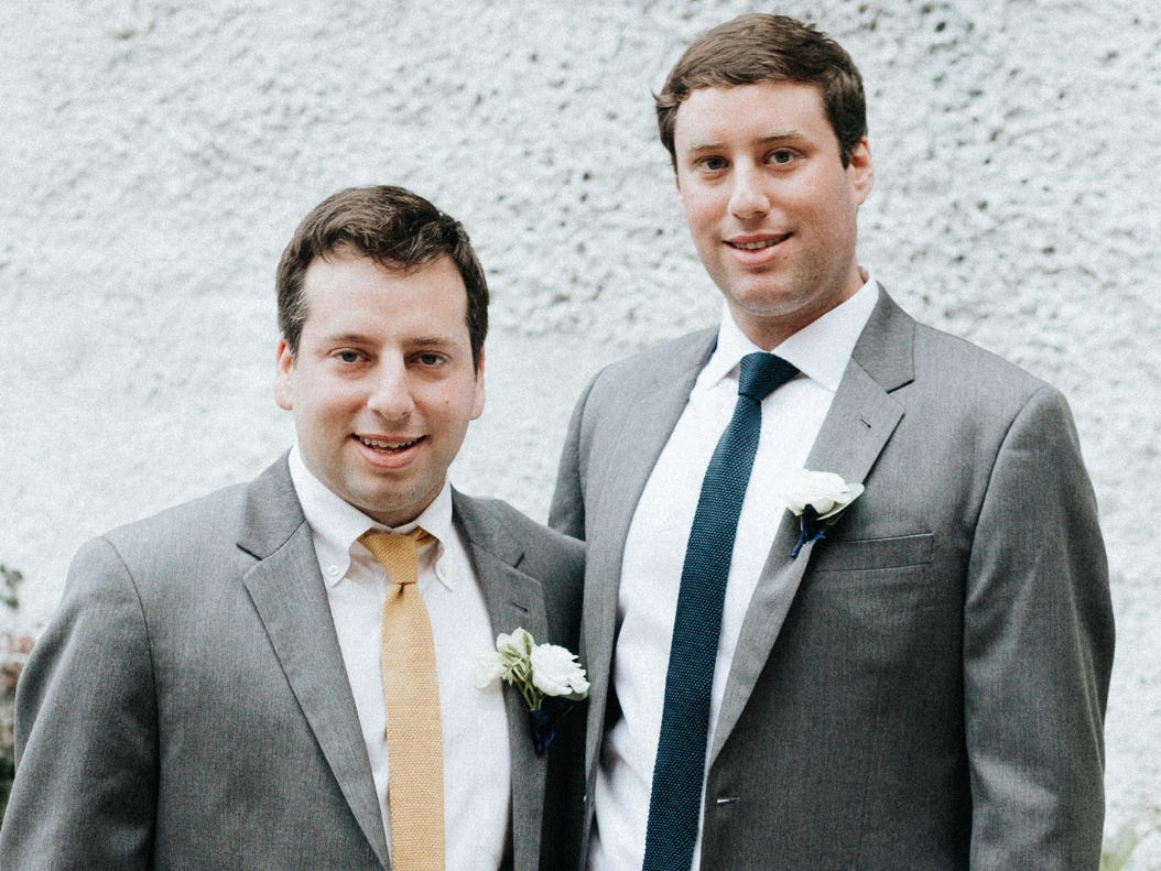 Jason Ackerman and his brother in suits