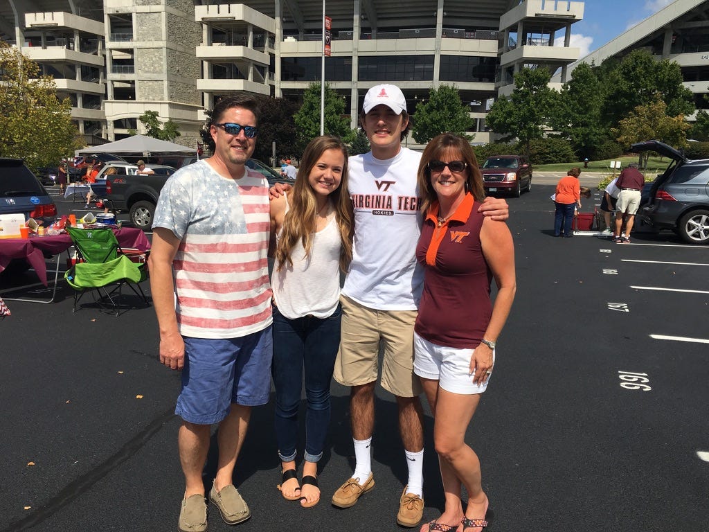 family posing for photo