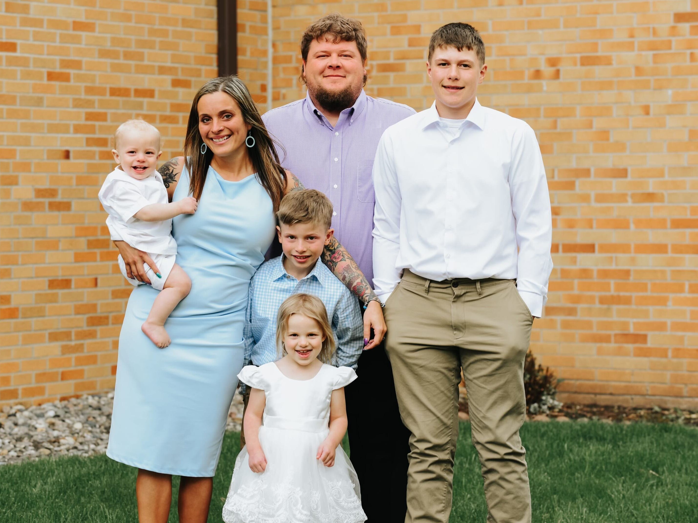 The author poses with her family.
