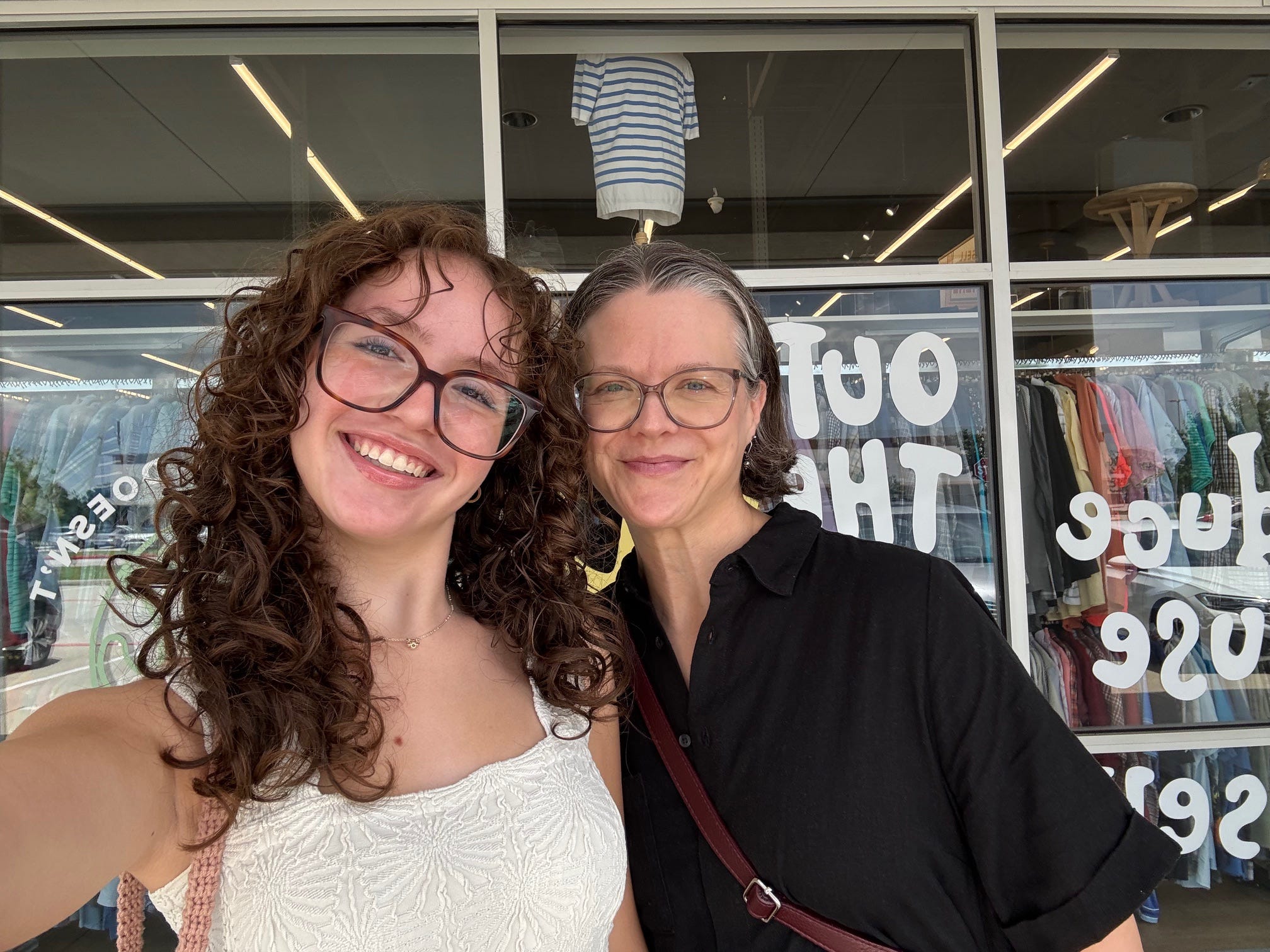 Mom and daughter at thrift store