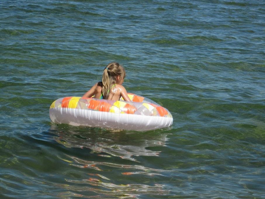 a child in a tube in water