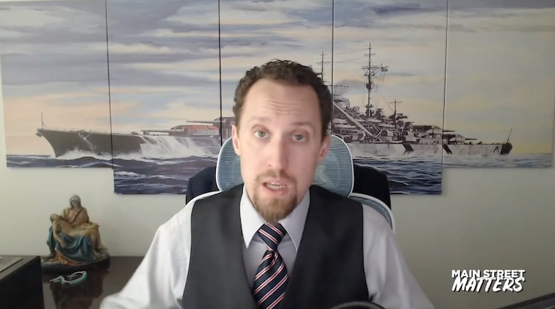E.J. Antoni, Trump's nominee to lead the Bureau of Labor Statistics, giving an interview in front of artwork of what appears to be the Nazi battleship the Bismarck. It is one of multiple interviews he has given in front of the artwork.