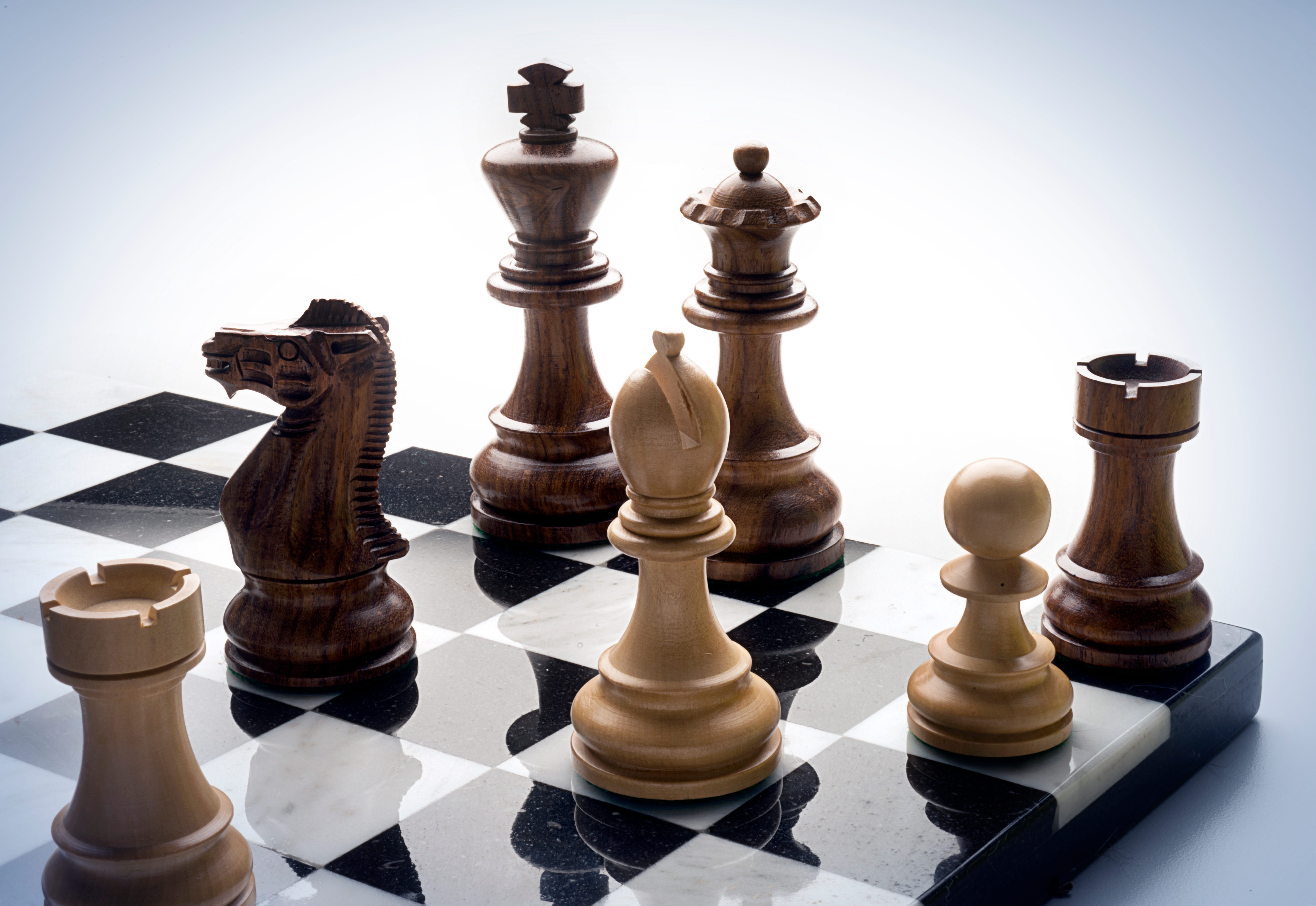 A chess board with pieces.