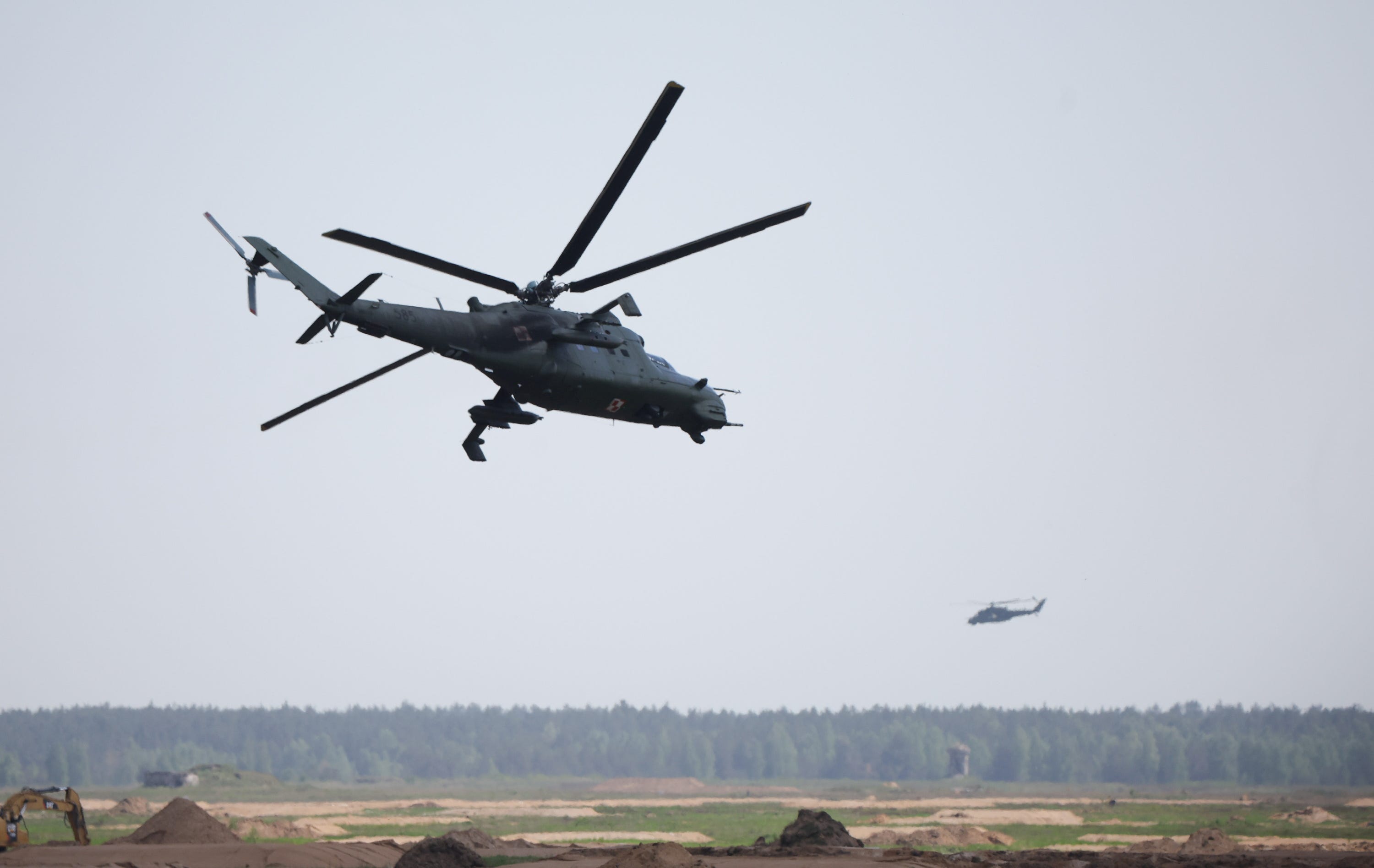 A Polish Mi-24 flies during a defense exercise in 2022.