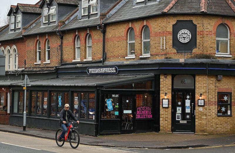 A general view of a Pizza Express restaurant in Woking in Surrey, southwest of London, is pictured on January 2, 2022. (Photo by Justin TALLIS / AFP) (Photo by JUSTIN TALLIS/AFP via Getty Images)