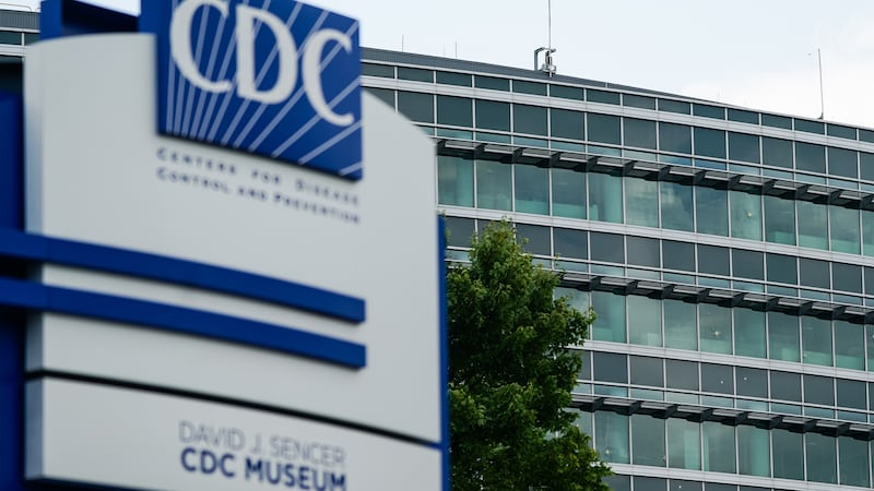Bullet holes are seen in windows at the Centers For Disease Control (CDC) Global Headquarters following a shooting that left two dead, on August 9, 2025 in Atlanta, Georgia. On August 8, a gunman opened fire near the headquarters of the Centers for Disease Control, killing a DeKalb County Police Department officer before being found dead by gunfire.