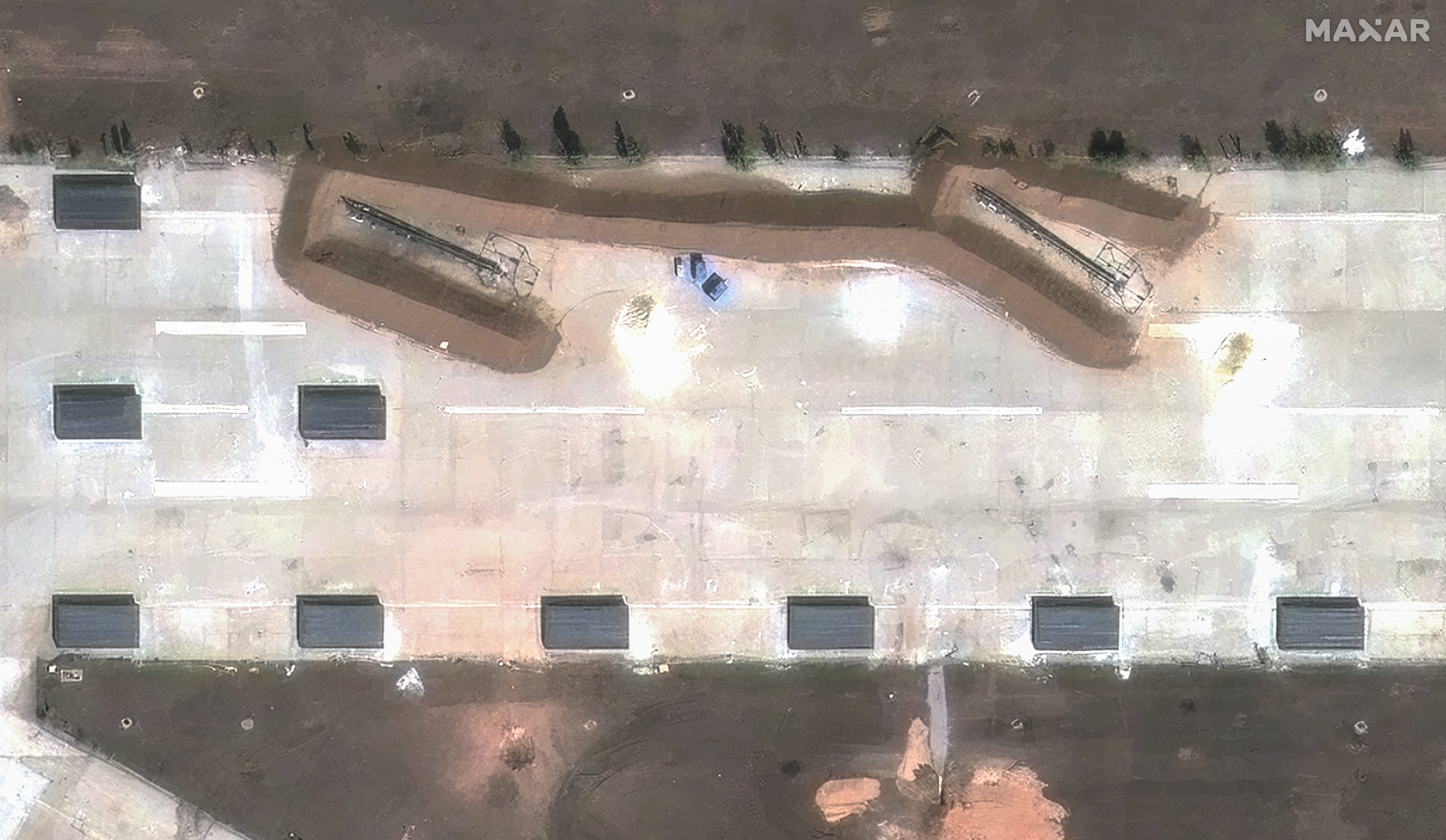 Launch rails and drone storage sheds are seen at the Donetsk airport on August 17.