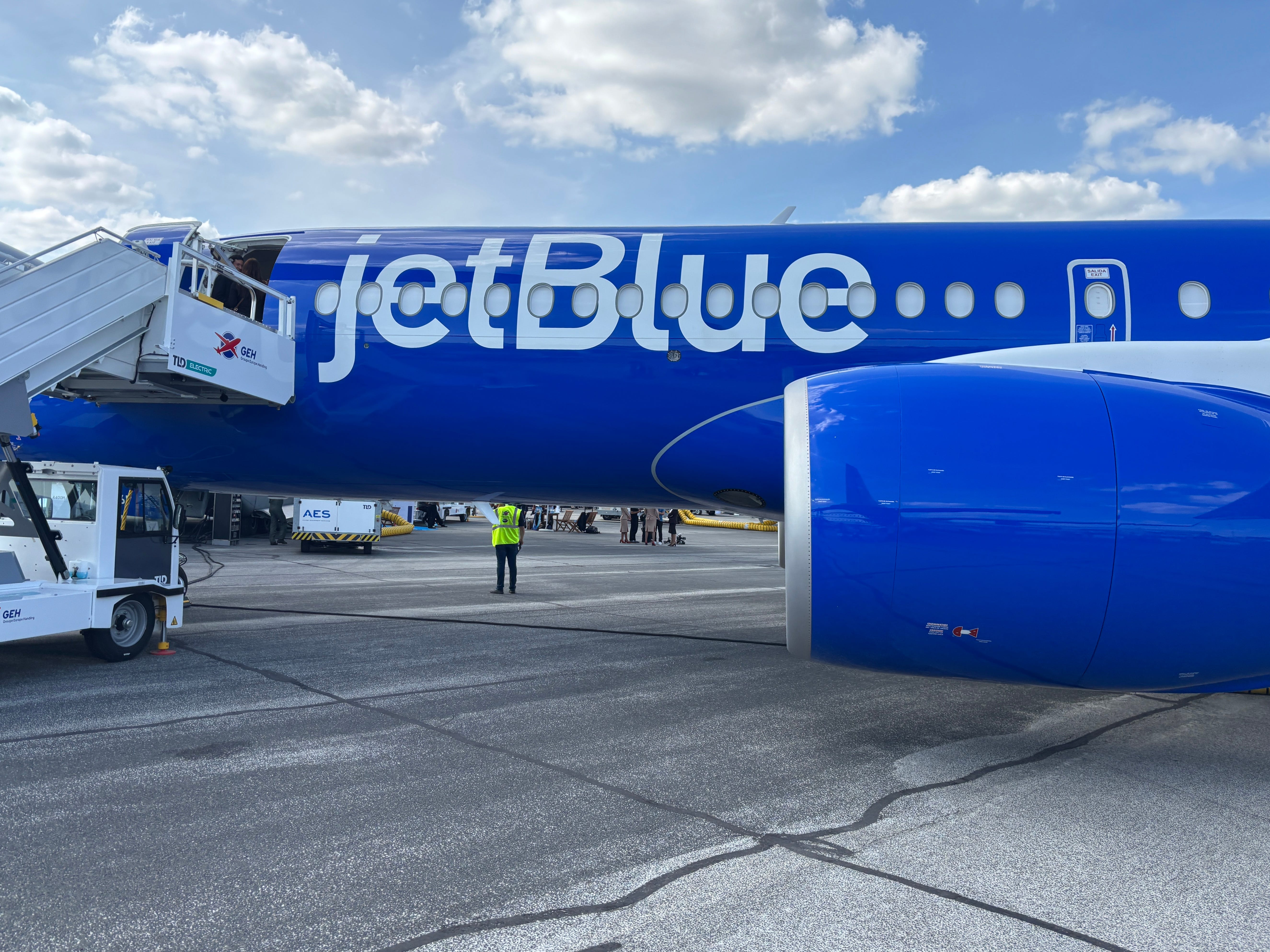 A side view of a JetBlue Airbus A220 on display at the 2025 Paris Air Show