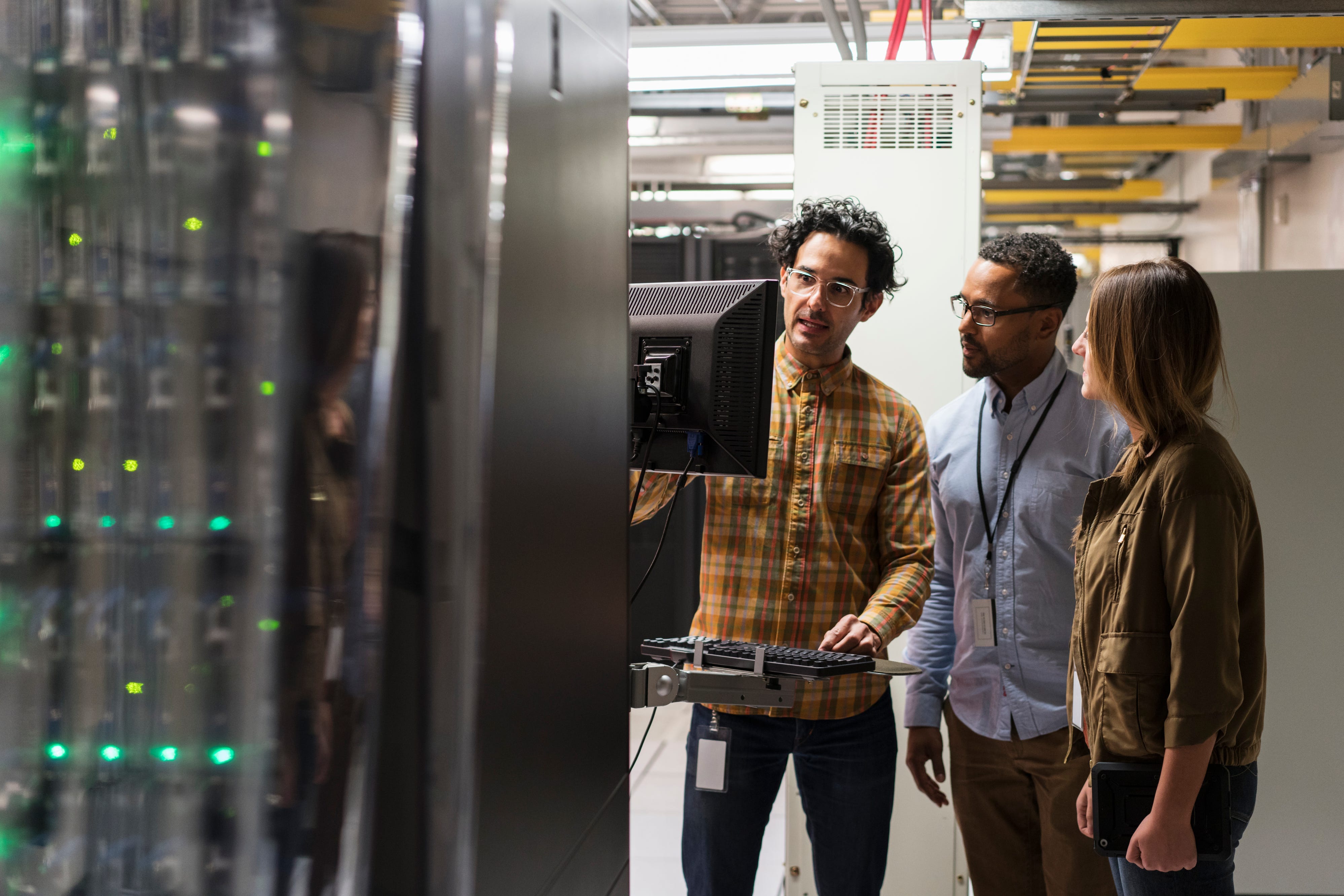 Technicians in server room