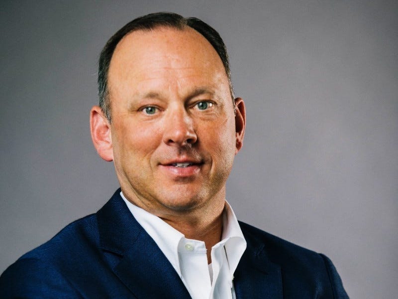 A headshot of Jim Sullivan, CEO of Smashburger