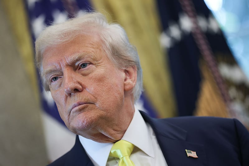WASHINGTON, DC - AUGUST 07: U.S. President Donald Trump listens to questions from reporters after speaking on economic data in the Oval Office on August 07, 2025 in Washington, DC. Trump fired Bureau of Labor Statistics Commissioner Dr. Erika McEntarfer on August 1st, claiming the agency issued “phony” jobs numbers during the Biden administration to aid Democrats. (Photo by Win McNamee/Getty Images)