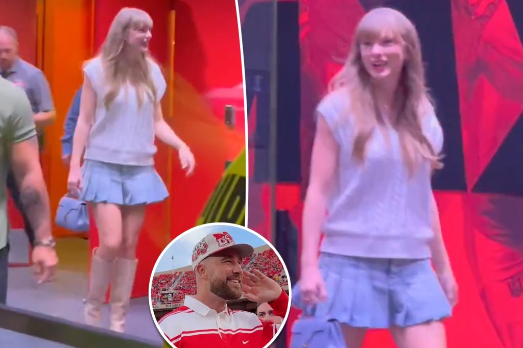 Taylor Swift pairs her new engagement ring with a pleated miniskirt at Nebraska vs. Cincinnati game