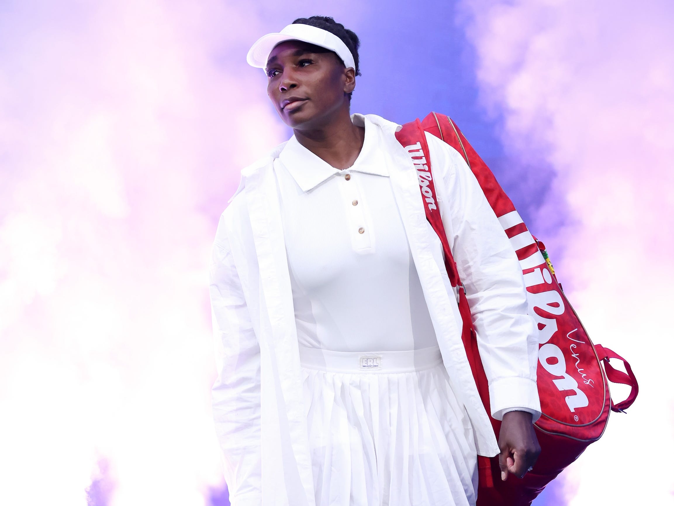 Venus Williams steps onto the court at the US Open while wearing an all white outfit.