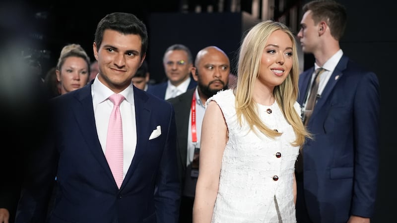 MILWAUKEE, WISCONSIN - JULY 16: Tiffany Trump, daughter of former U.S. President Donald Trump, walks with her husband Michael Boulos (L) on the second day of the Republican National Convention at the Fiserv Forum on July 16, 2024 in Milwaukee, Wisconsin. Delegates, politicians, and the Republican faithful are in Milwaukee for the annual convention, concluding with former President Donald Trump accepting his party's presidential nomination. The RNC takes place from July 15-18. (Photo by Andrew Harnik/Getty Images)