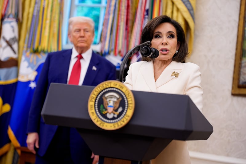 U.S. President Donald Trump looks on as interim U.S. Attorney for Washington, D.C. Jeanine Pirro speaks during her swearing in ceremony in the Oval Office of the White House on May 28, 2025 in Washington, DC.