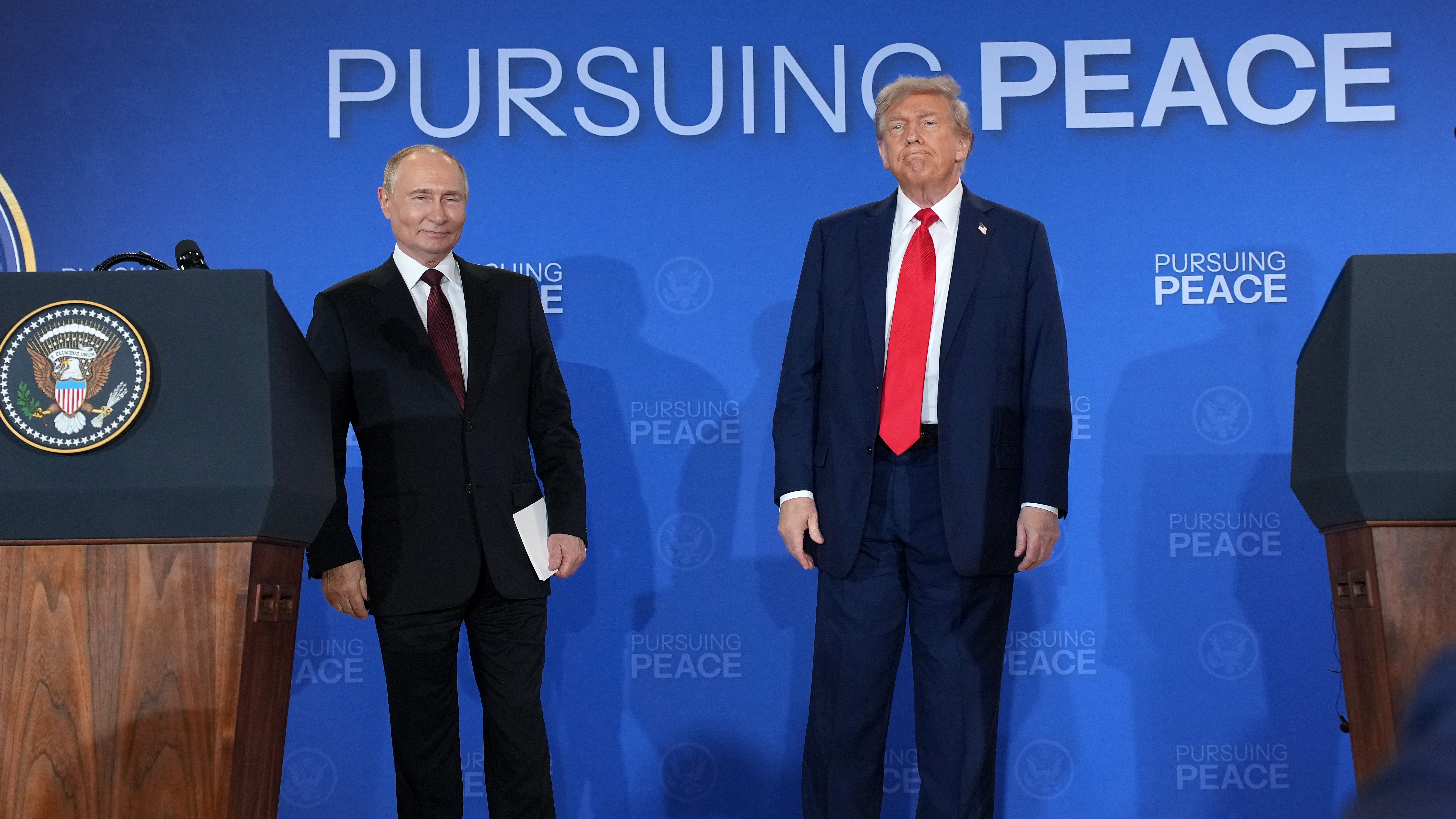 President Donald Trump (R) and Russian President Vladimir Putin leave following a press conference at Joint Base Elmendorf-Richardson on August 15, 2025 in Anchorage, Alaska.