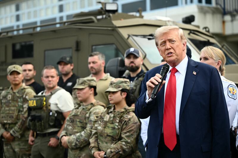 US President Donald Trump speaks while visiting federal troops at the US Park Police Anacostia operations facility in Washington, DC, on August 21, 2025. Trump said he plans to patrol Washington's streets on Thursday with troops he deployed to the US capital in a show of force against what he claims is a