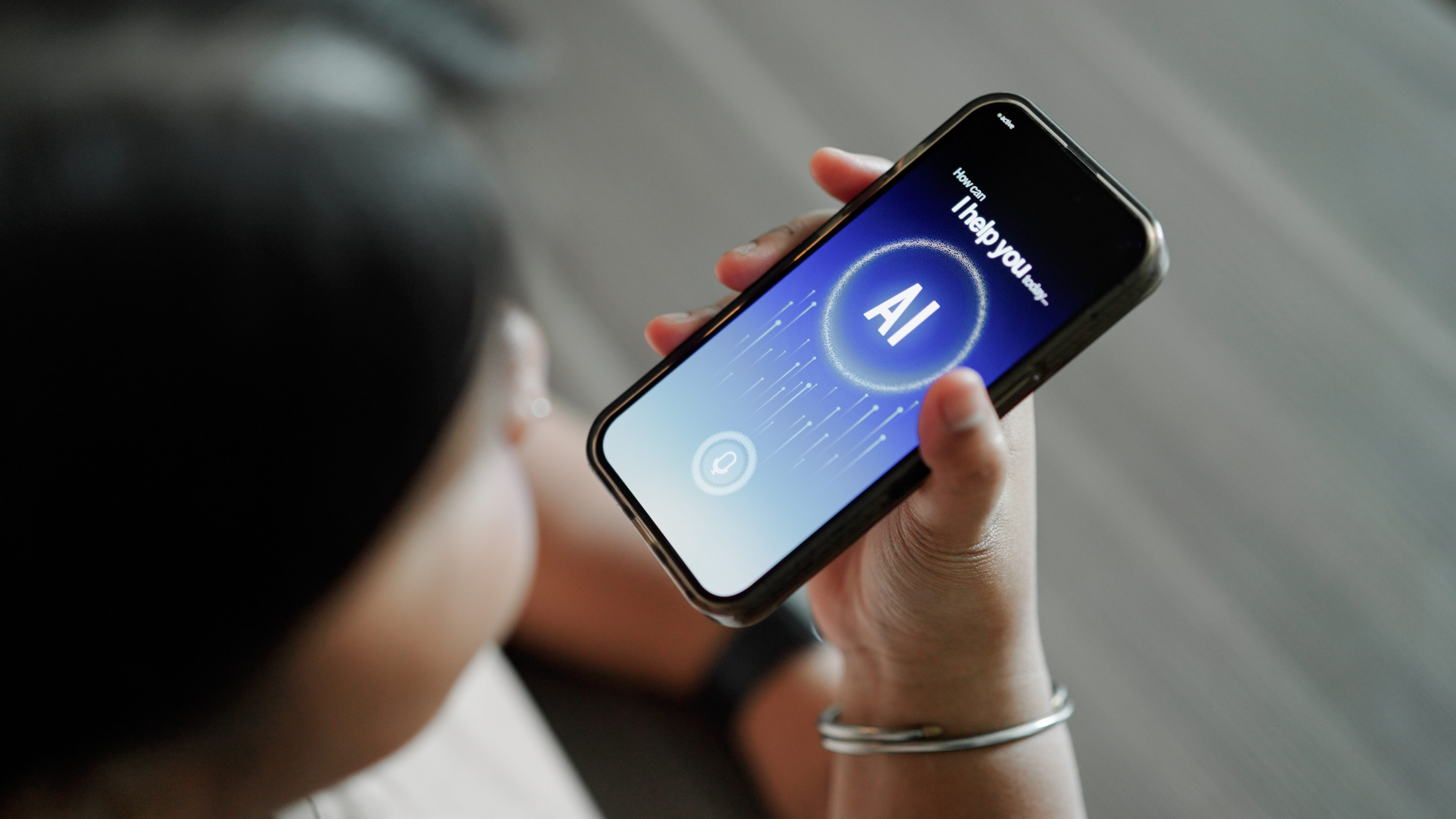 Asian woman using AI apps at home