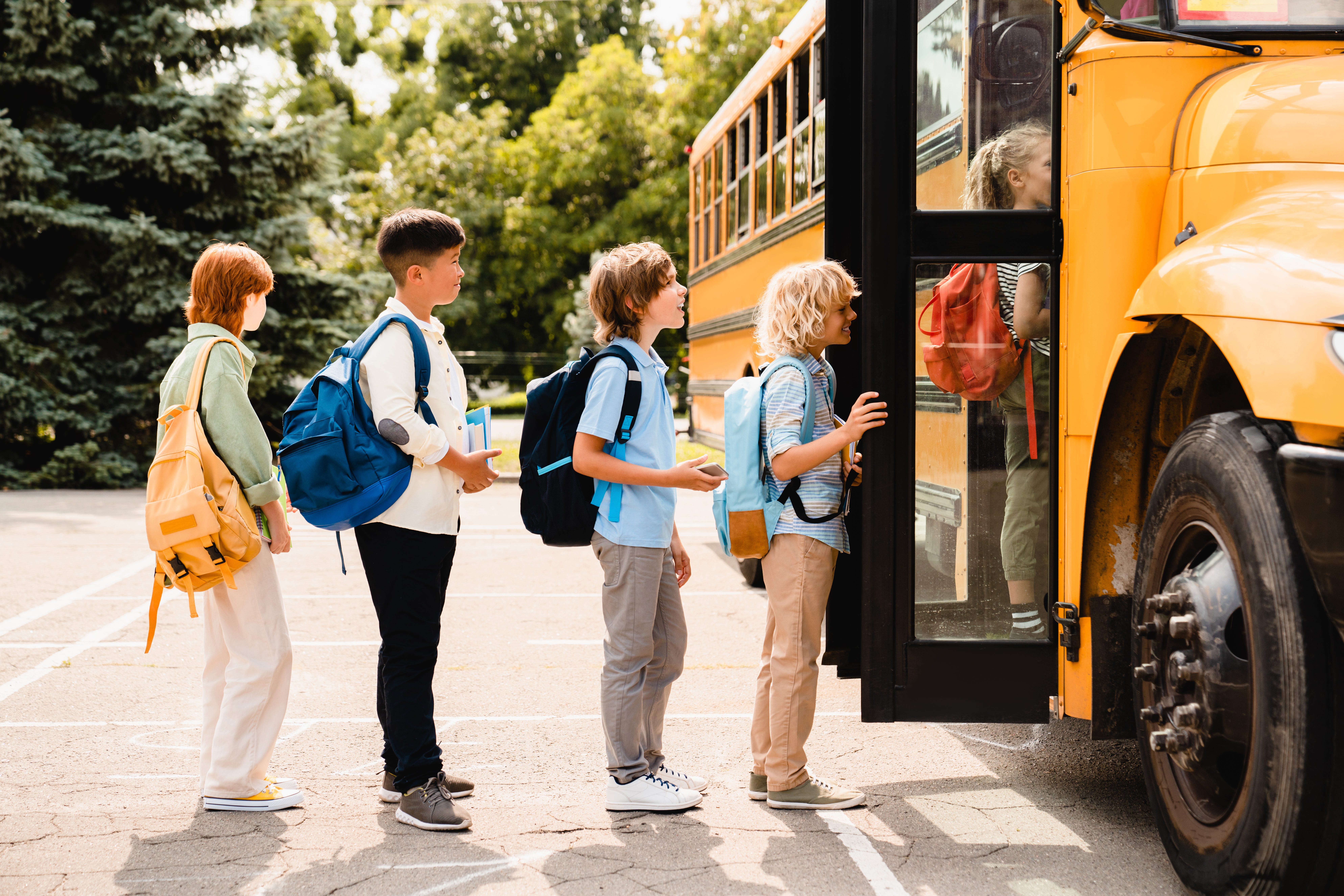 Kids in line for the school bus.