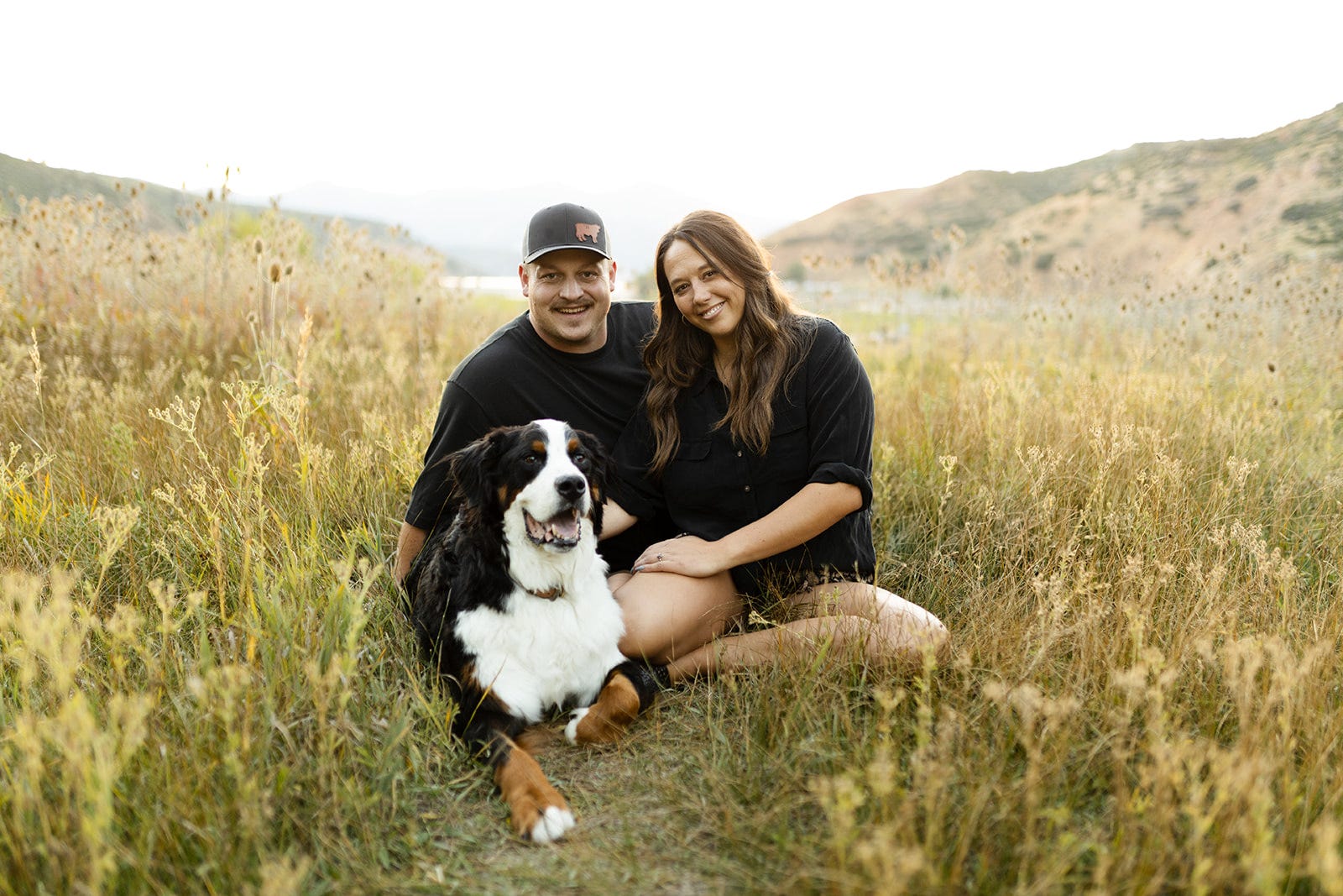 couple with their dog
