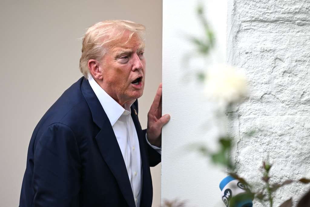 Donald Trump speaks to reporters at the White House, July 2025