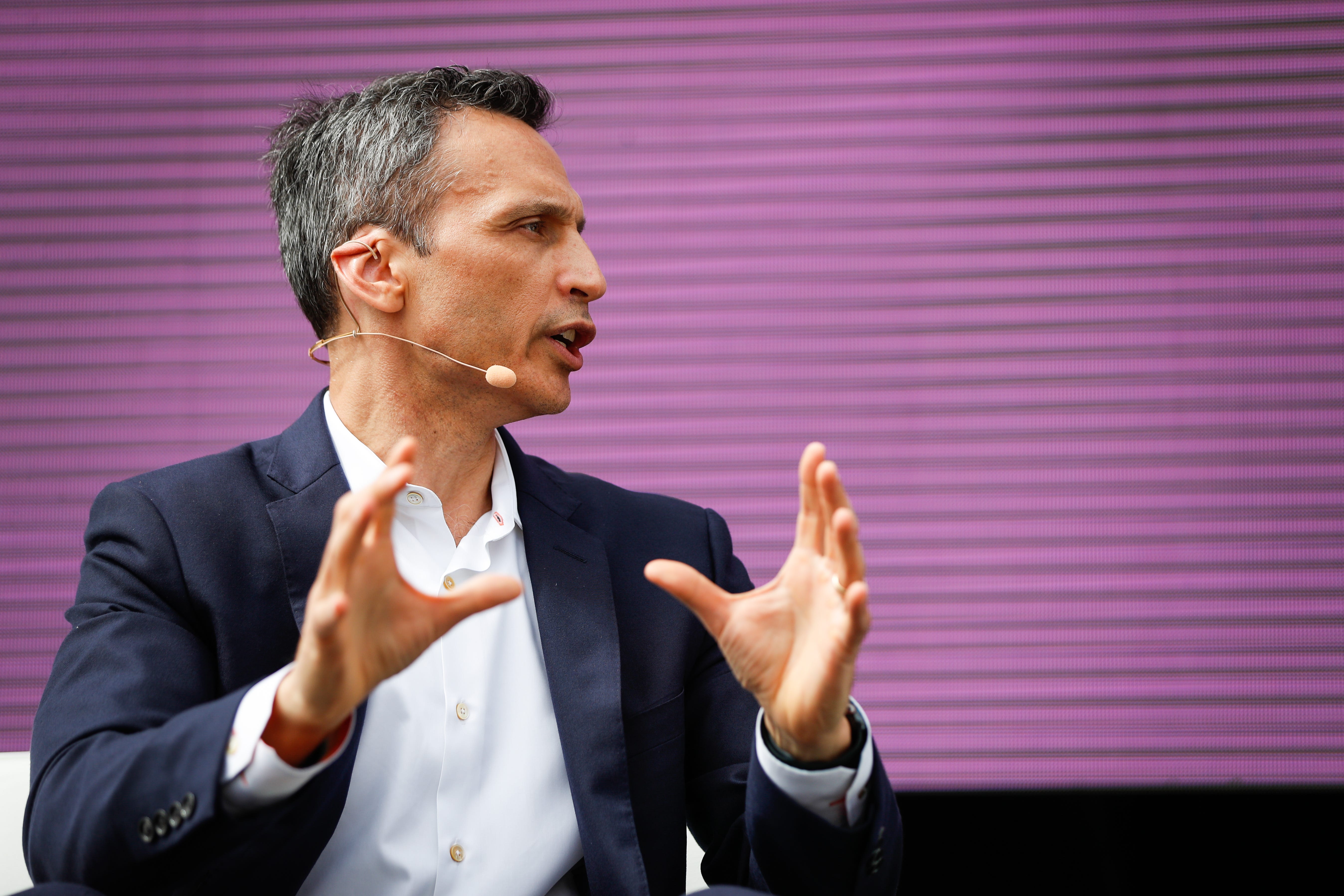 ESPN head Jimmy Pitaro speaks onstage at a company event, 2018