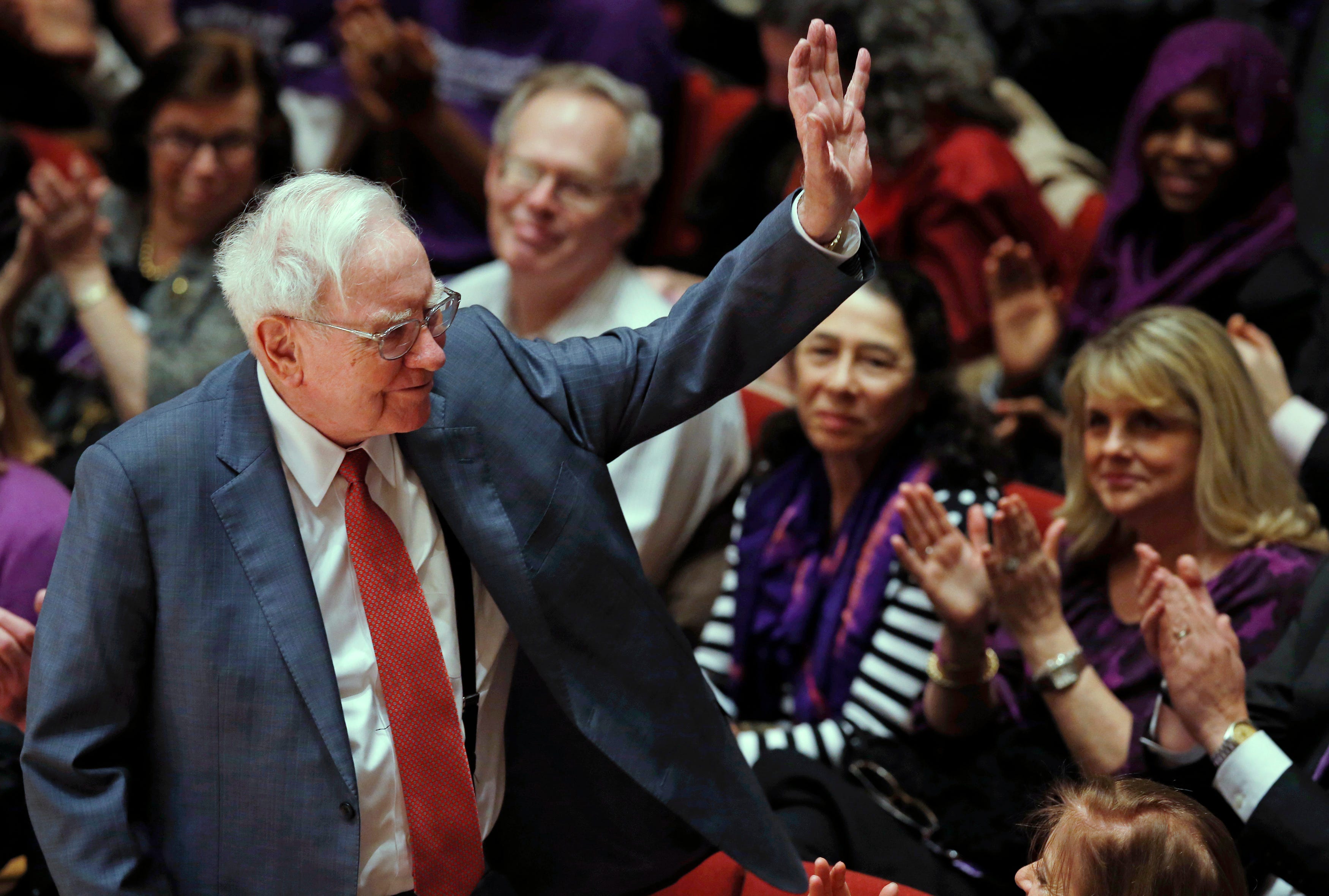 Warren Buffett hand waves Northwestern crowd