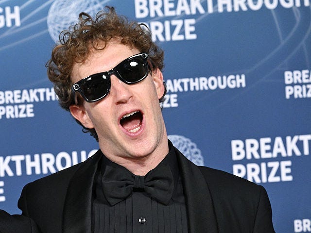 mark zuckerberg in black suit and sunglasses