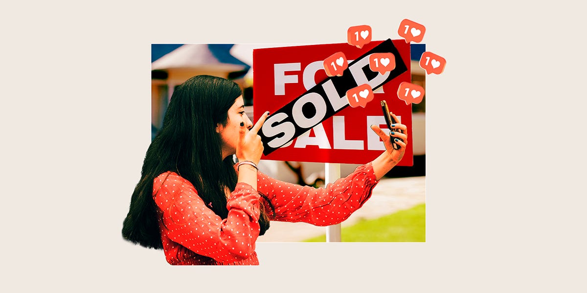 A young woman is livestreaming on her phone in front of a SOLD for sale sign, and surrounded by social media likes.