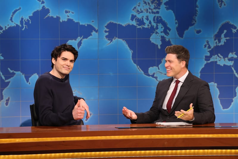 Michael Longfellow and anchor Colin Jost during Weekend Update