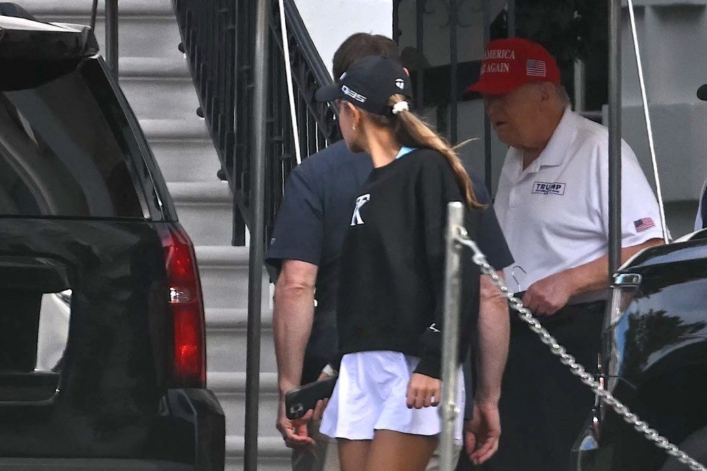 Donald Trump and his granddaughter Kai Trump leaving the White House.