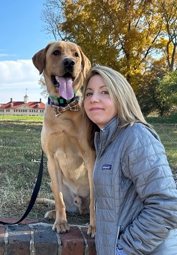Photo of Jessica Aber with her dog.