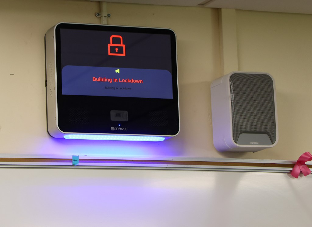 School lockdown announcement screen and speaker.
