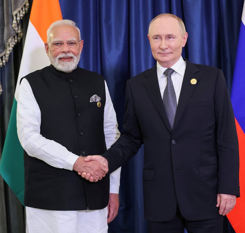 Russian President Vladimir Putin shakes hands with Indian Prime Minister Narendra Modi before their meeting on the sidelines of the Shanghai Cooperation Organisation (SCO) summit in Tianjin, China, September 1, 2025. India's Press Information Bureau/Handout via REUTERS    THIS IMAGE HAS BEEN SUPPLIED BY A THIRD PARTY. NO RESALES. NO ARCHIVES.
