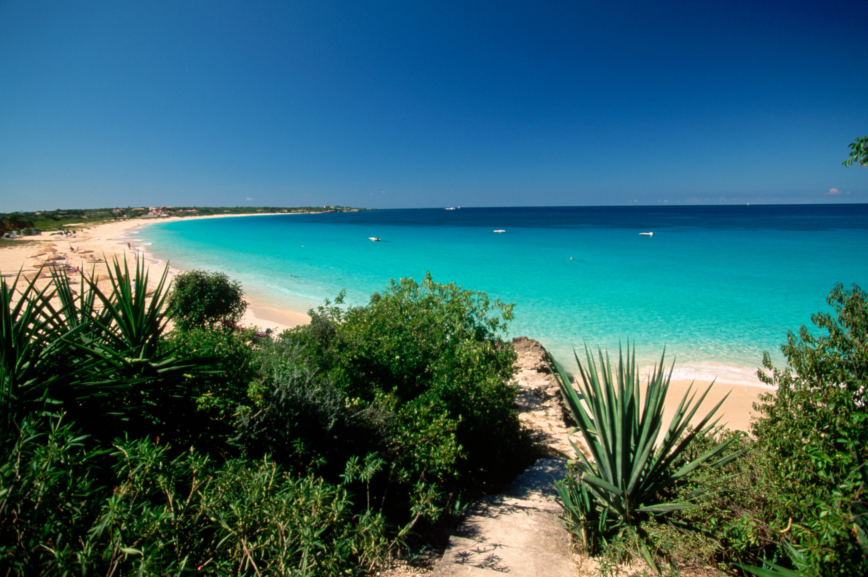 Mead's Bay, as seen from behind some bushes at Malliouhana, Anguilla, British West Indies.