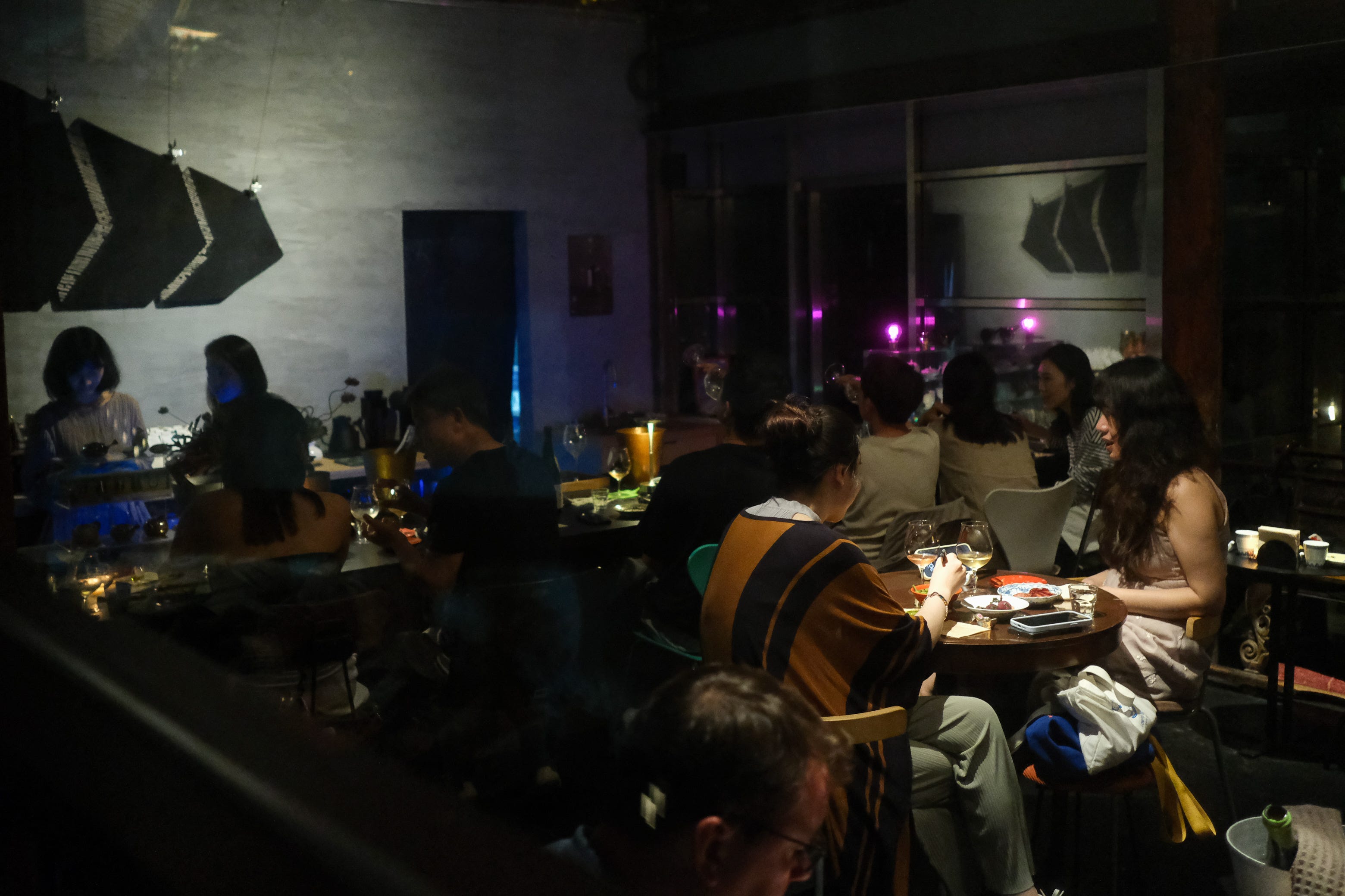 Diners at night at 010 Beijing Natural.