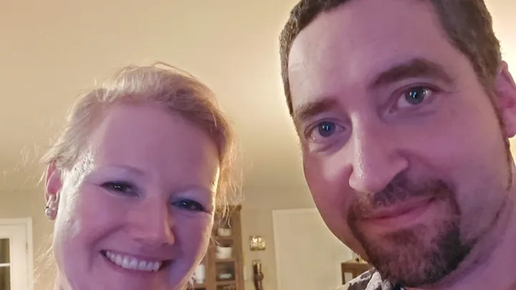 Photo of a smiling man and woman.