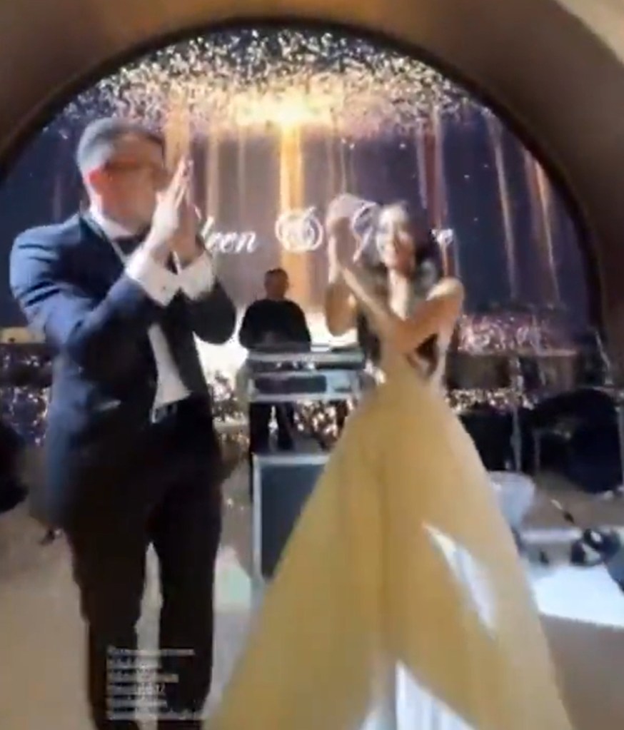 One of the bride's girlfriends saw the man run off with the box of gifts.