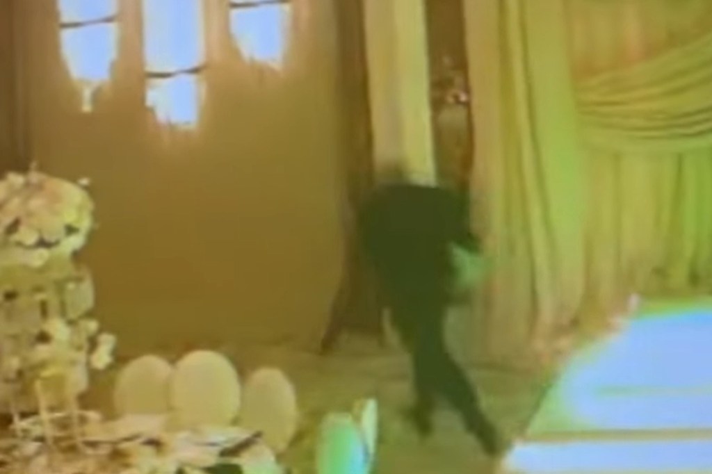 The man slipped out a side door and drove off in a black Mercedes.